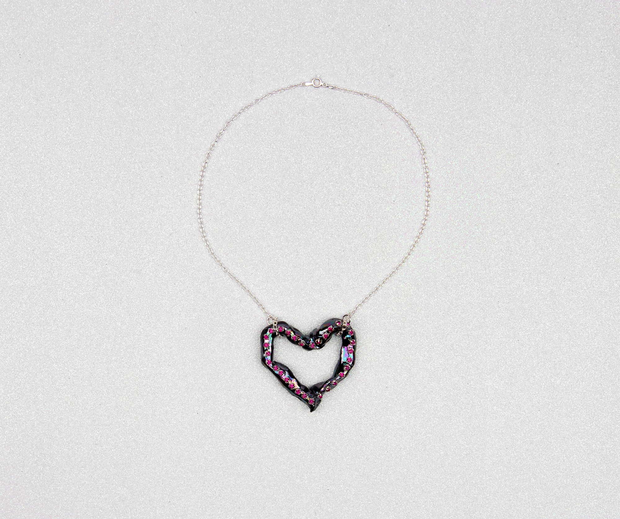 Heart necklace with pink crystals