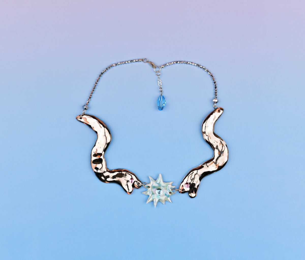 Statement necklace with two silver snakes