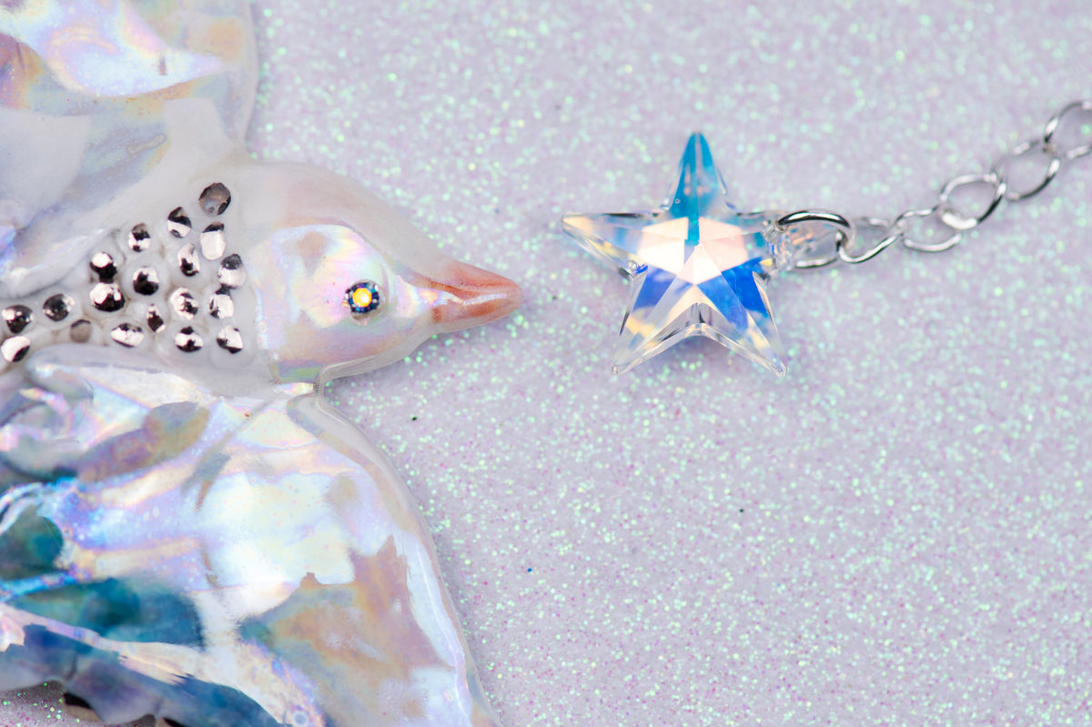 Celestial bird with pearl stars necklace