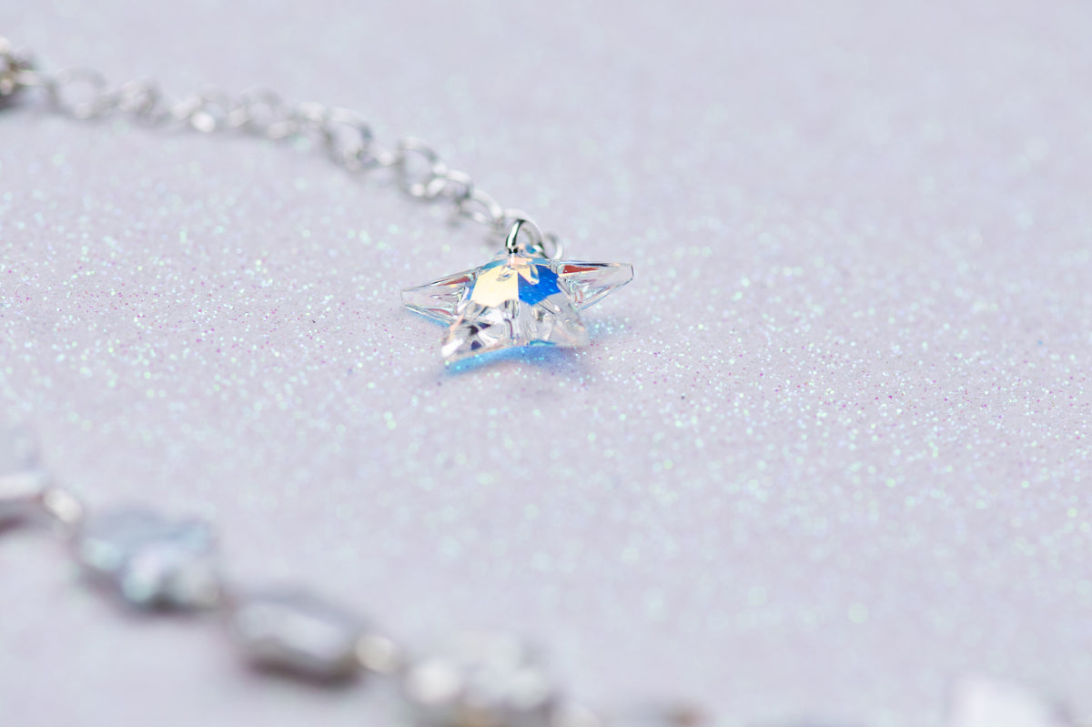 Celestial bird with pearl stars necklace
