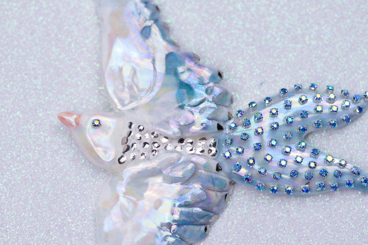 Celestial bird with pearl stars necklace