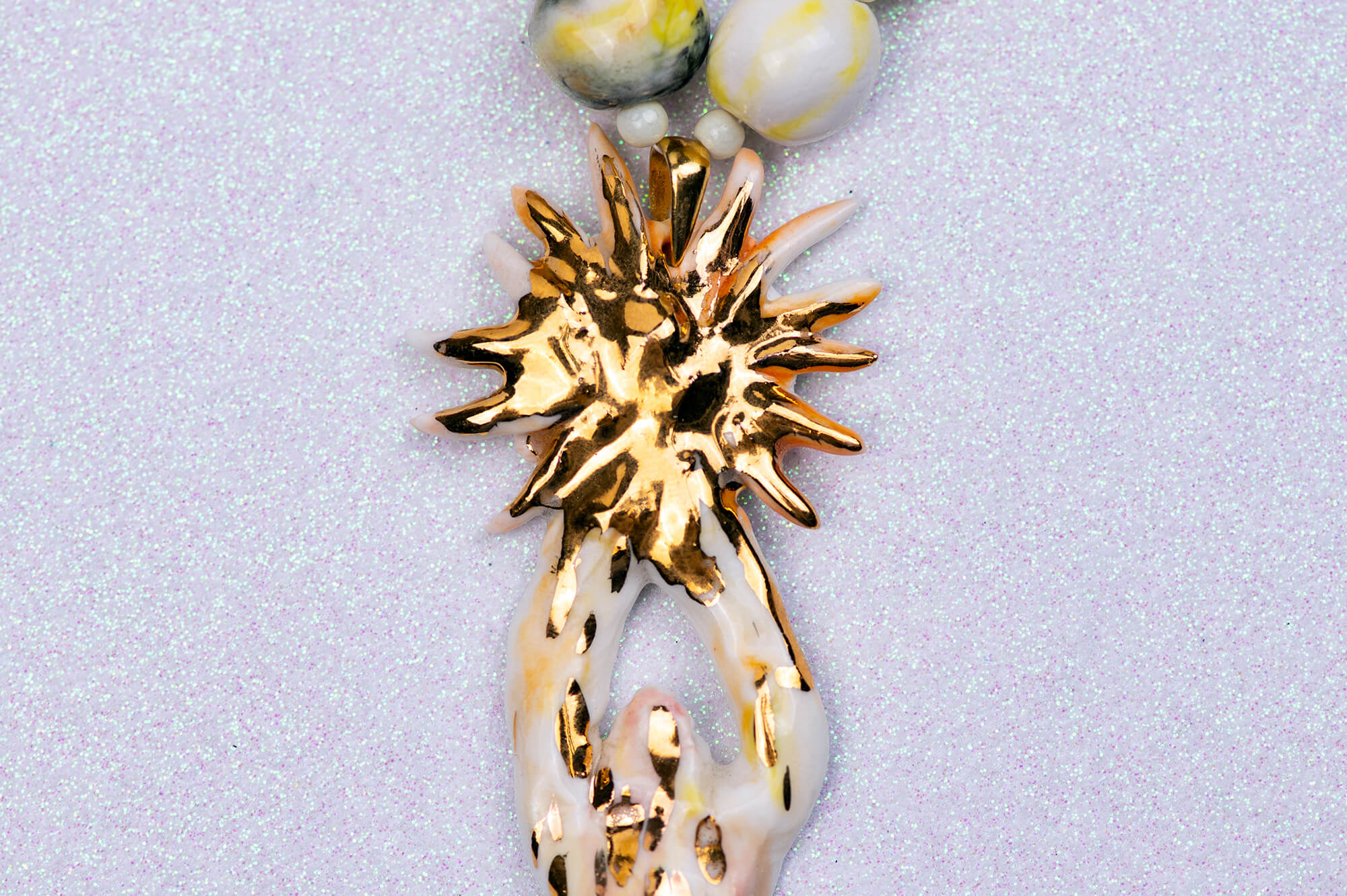 Angel with sun rays necklace