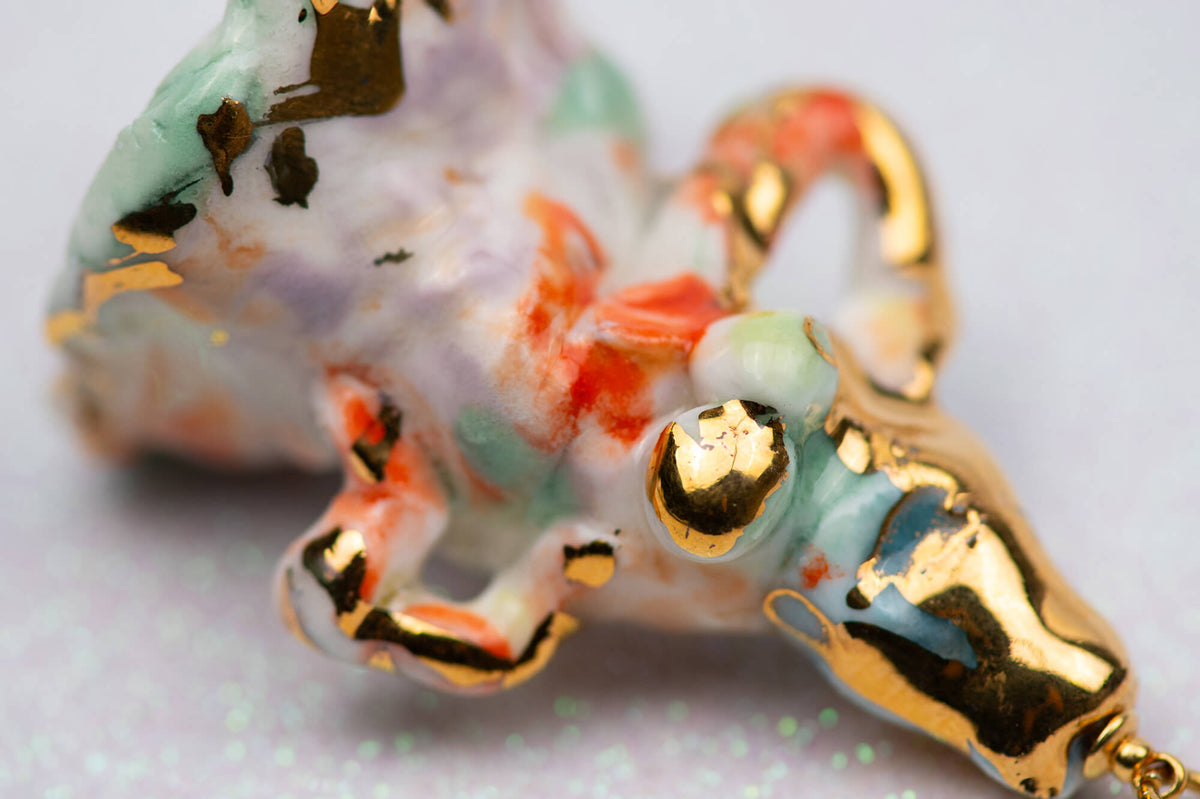 Artisan girl charm