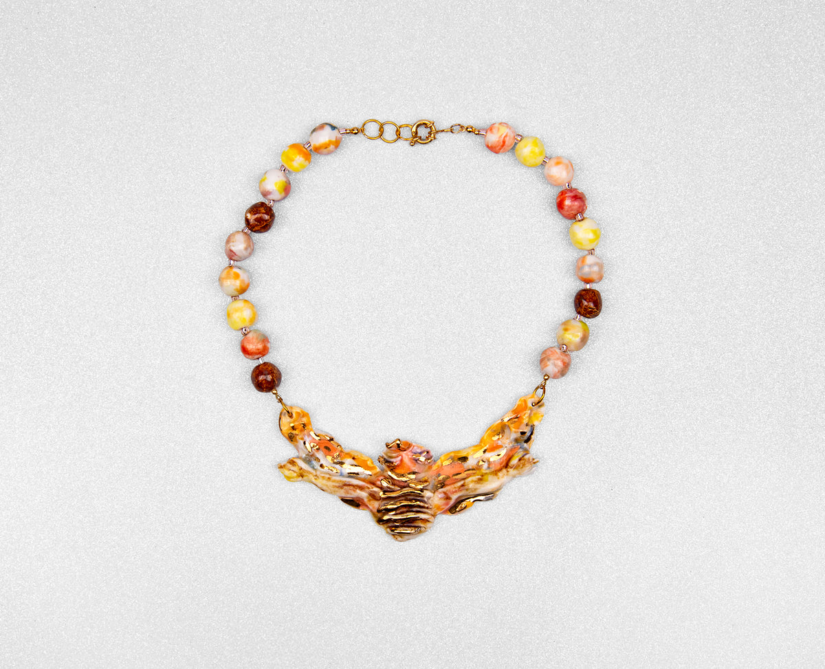 Gold bee necklace
