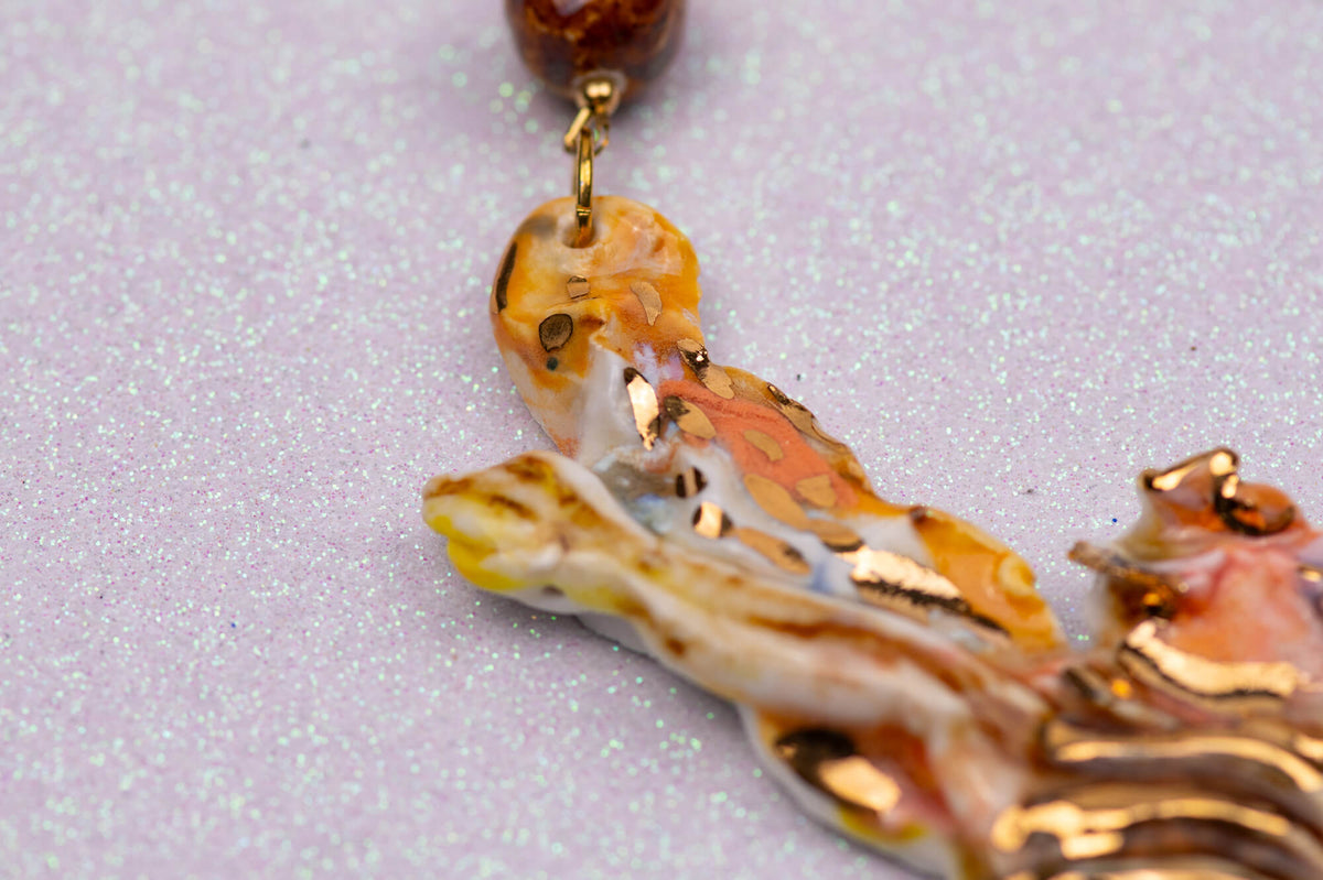 Gold bee necklace