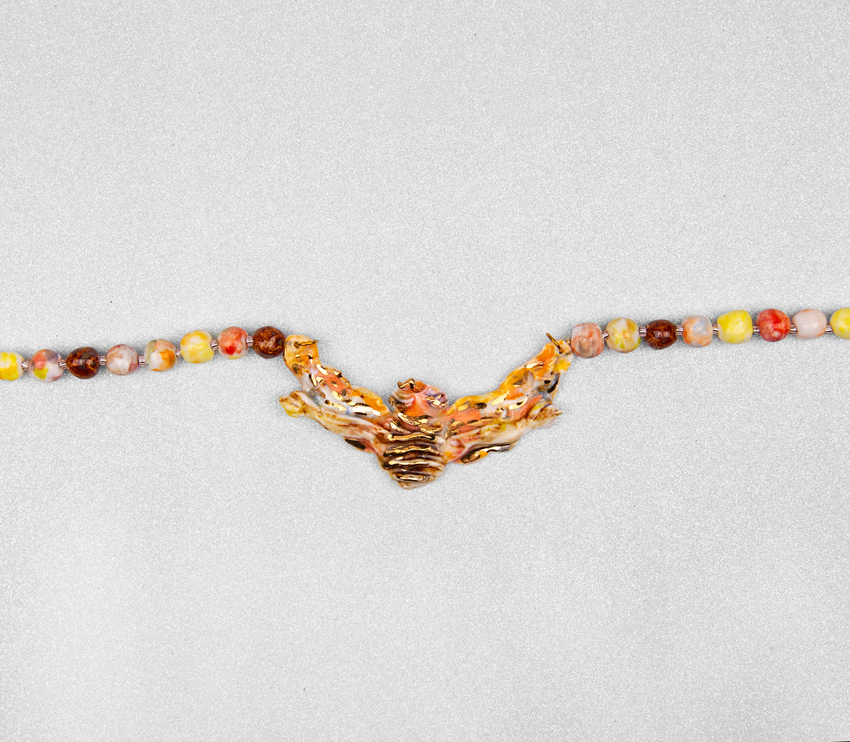 Gold bee necklace