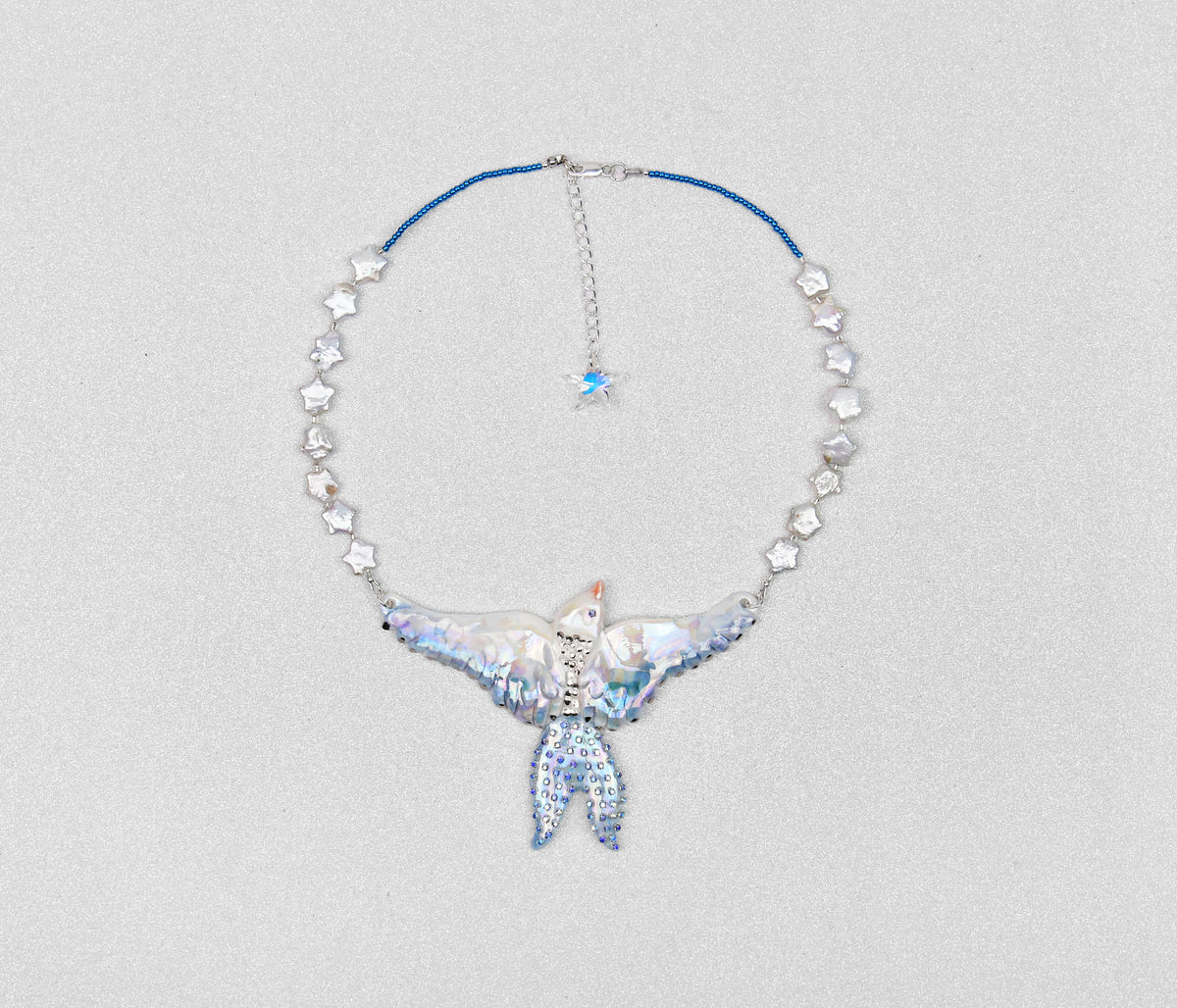 Celestial bird with pearl stars necklace
