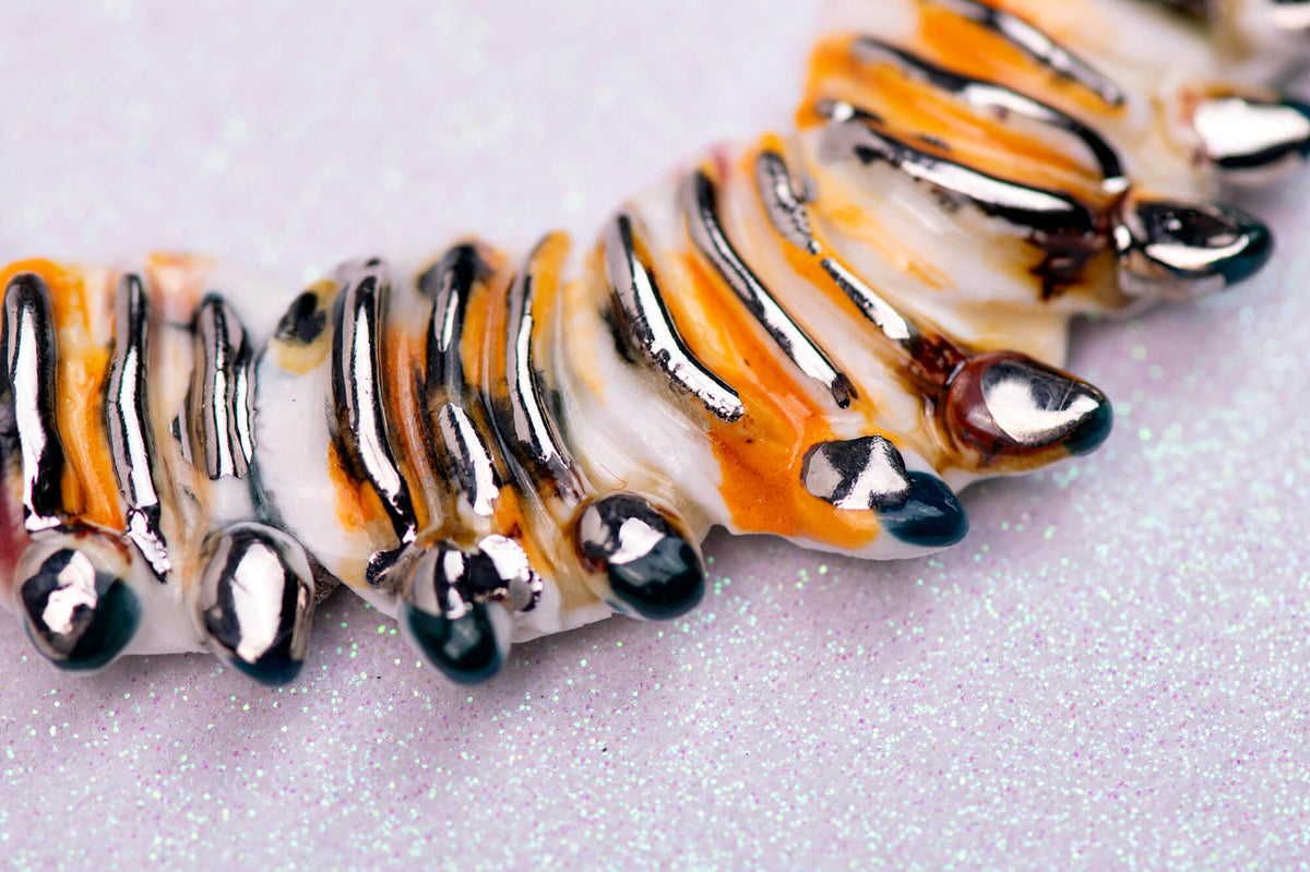 Orange stripes caterpillar necklace