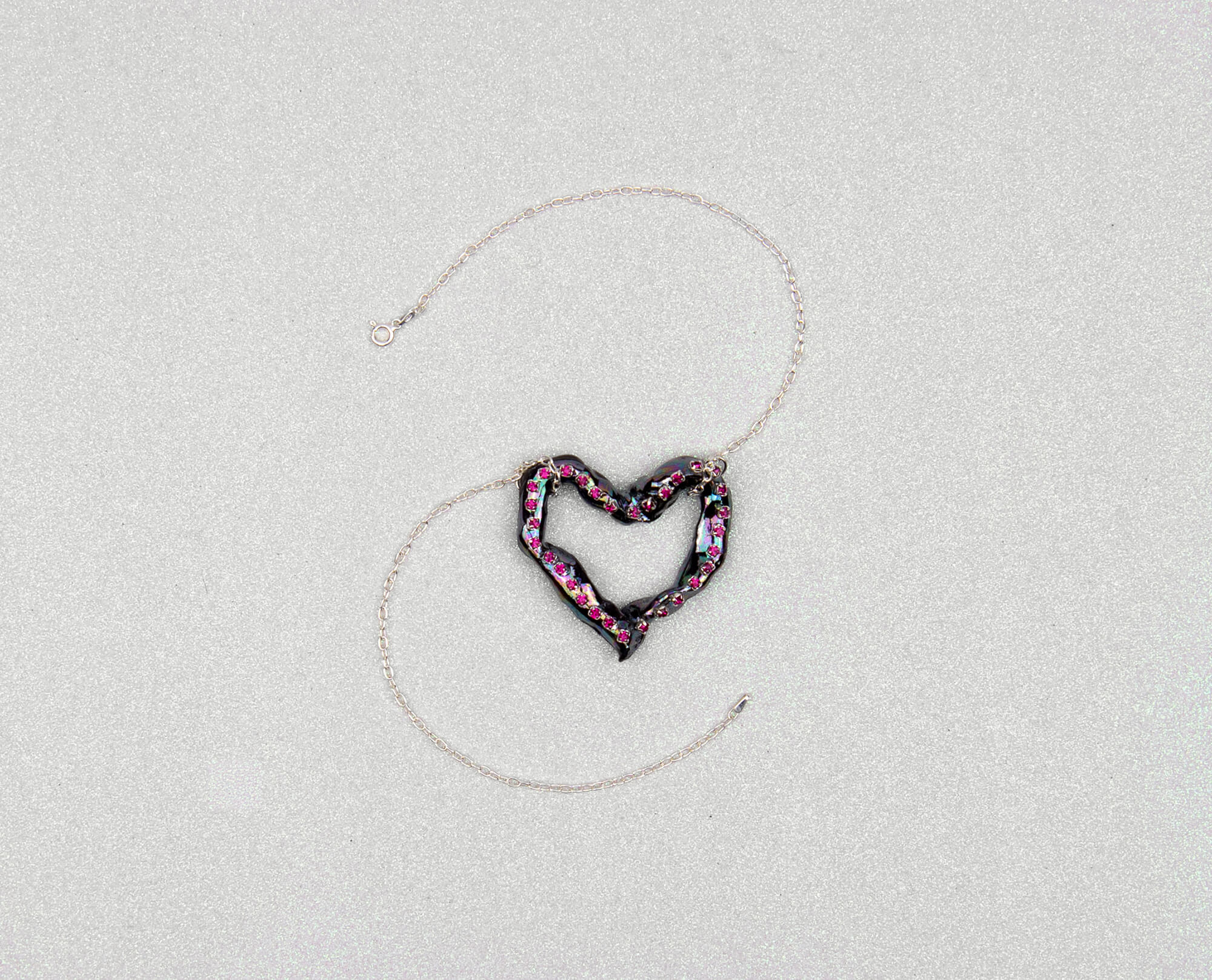 Heart necklace with pink crystals