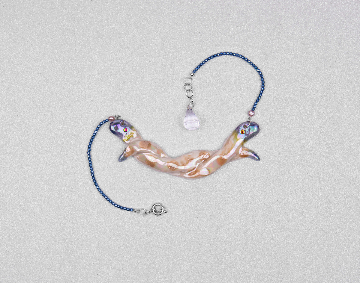 Entwined snakes necklace
