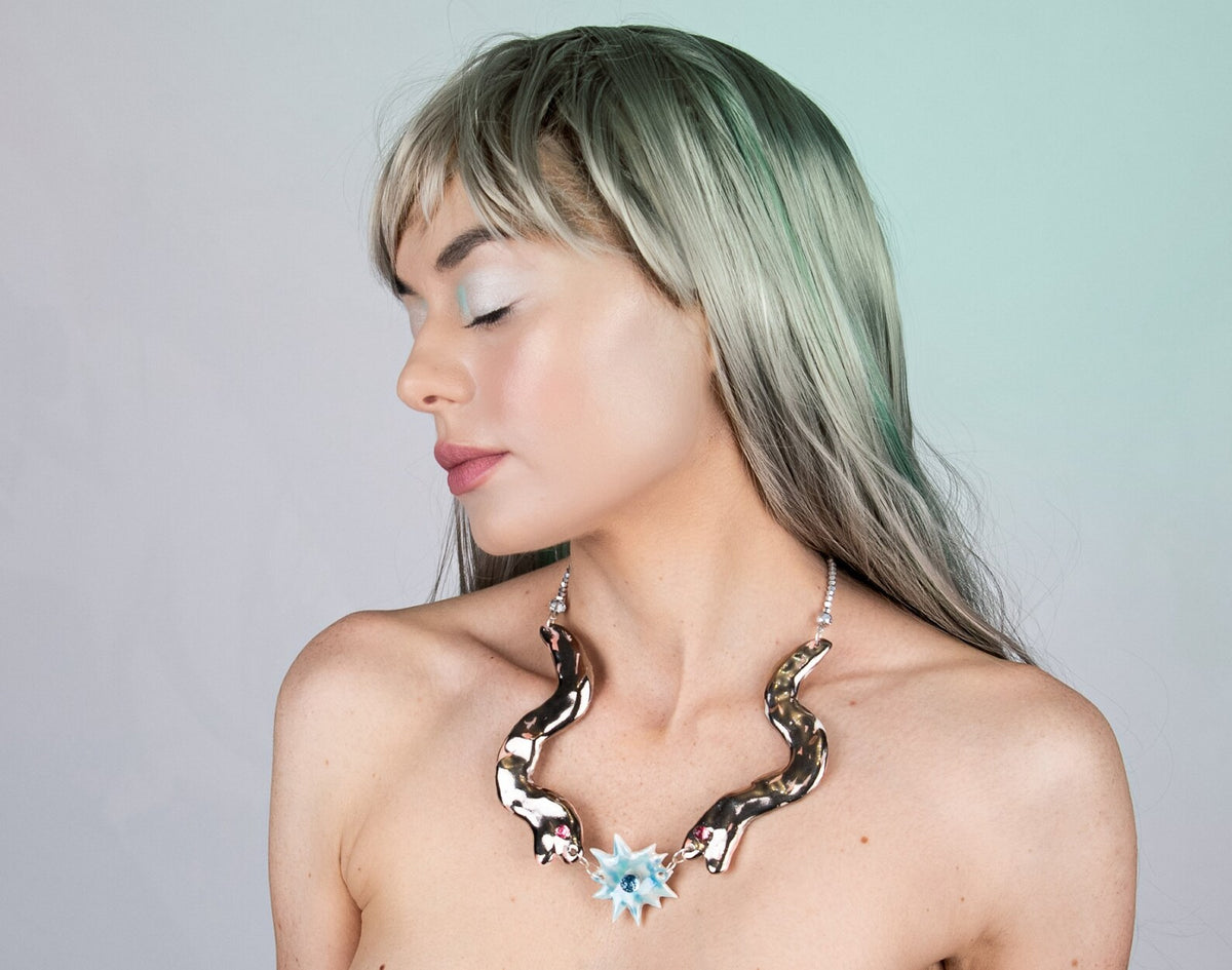 Statement necklace with two silver snakes