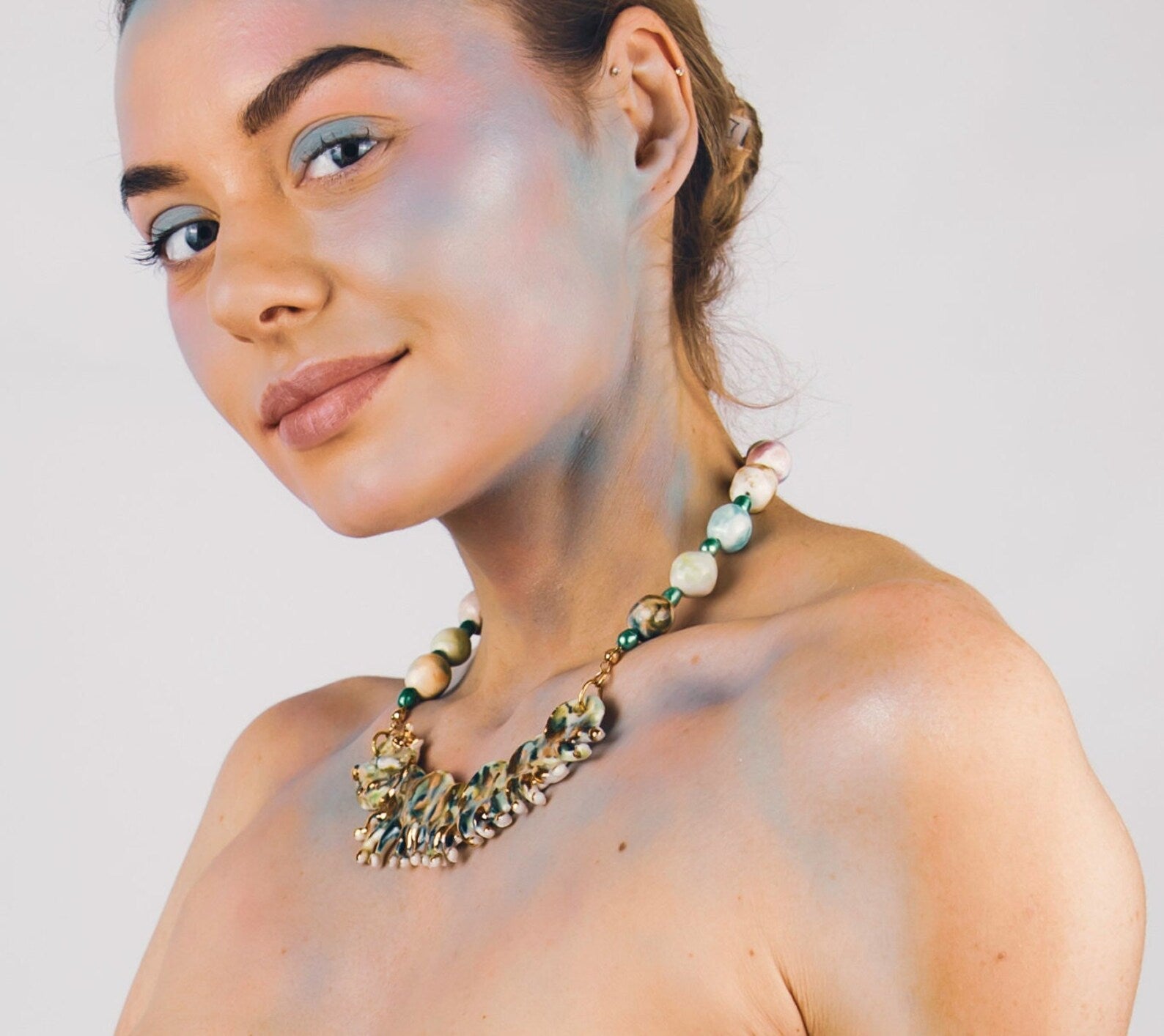 Gold and green caterpillar chocker