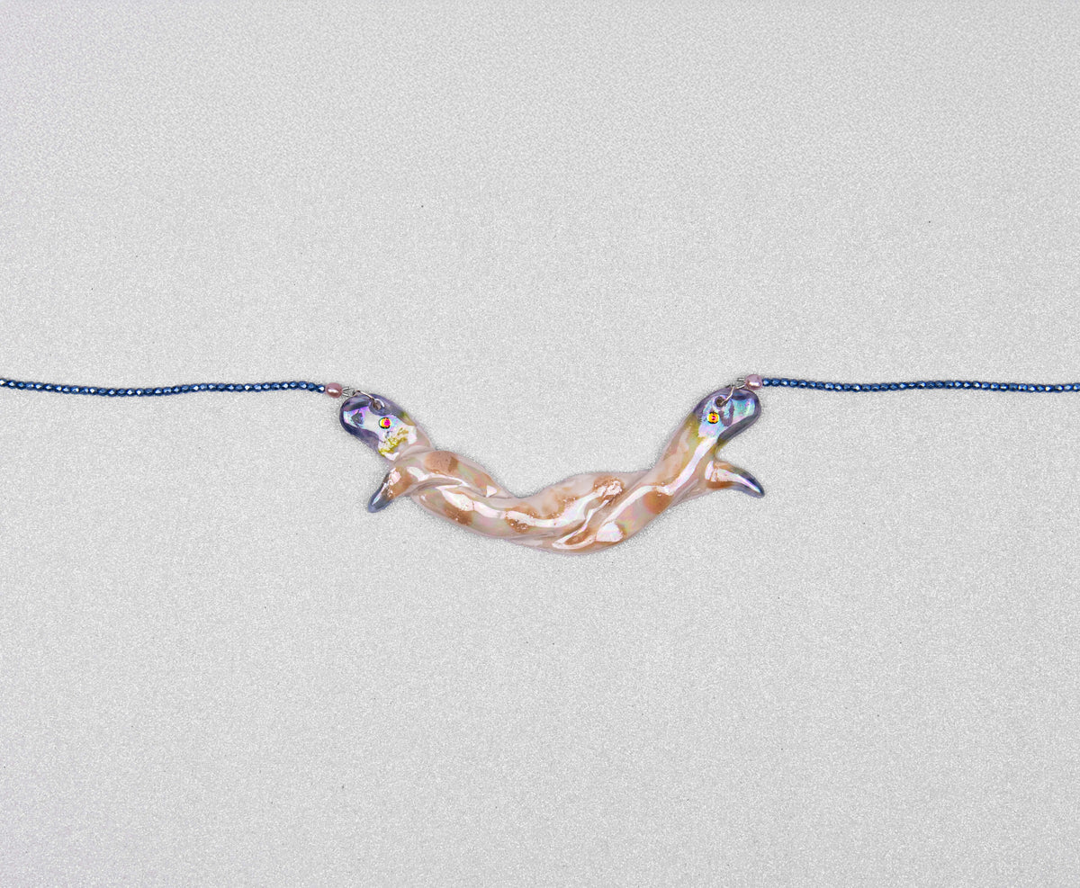 Entwined snakes necklace