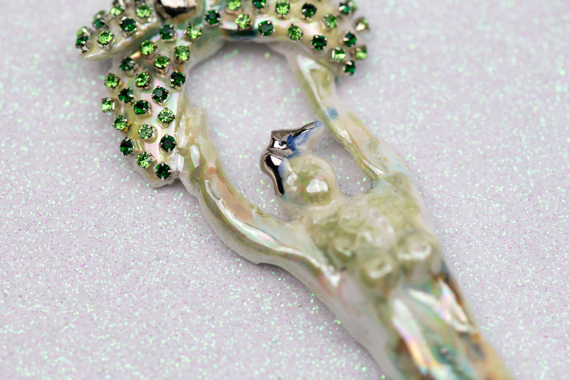 Mermaid with green flower charm