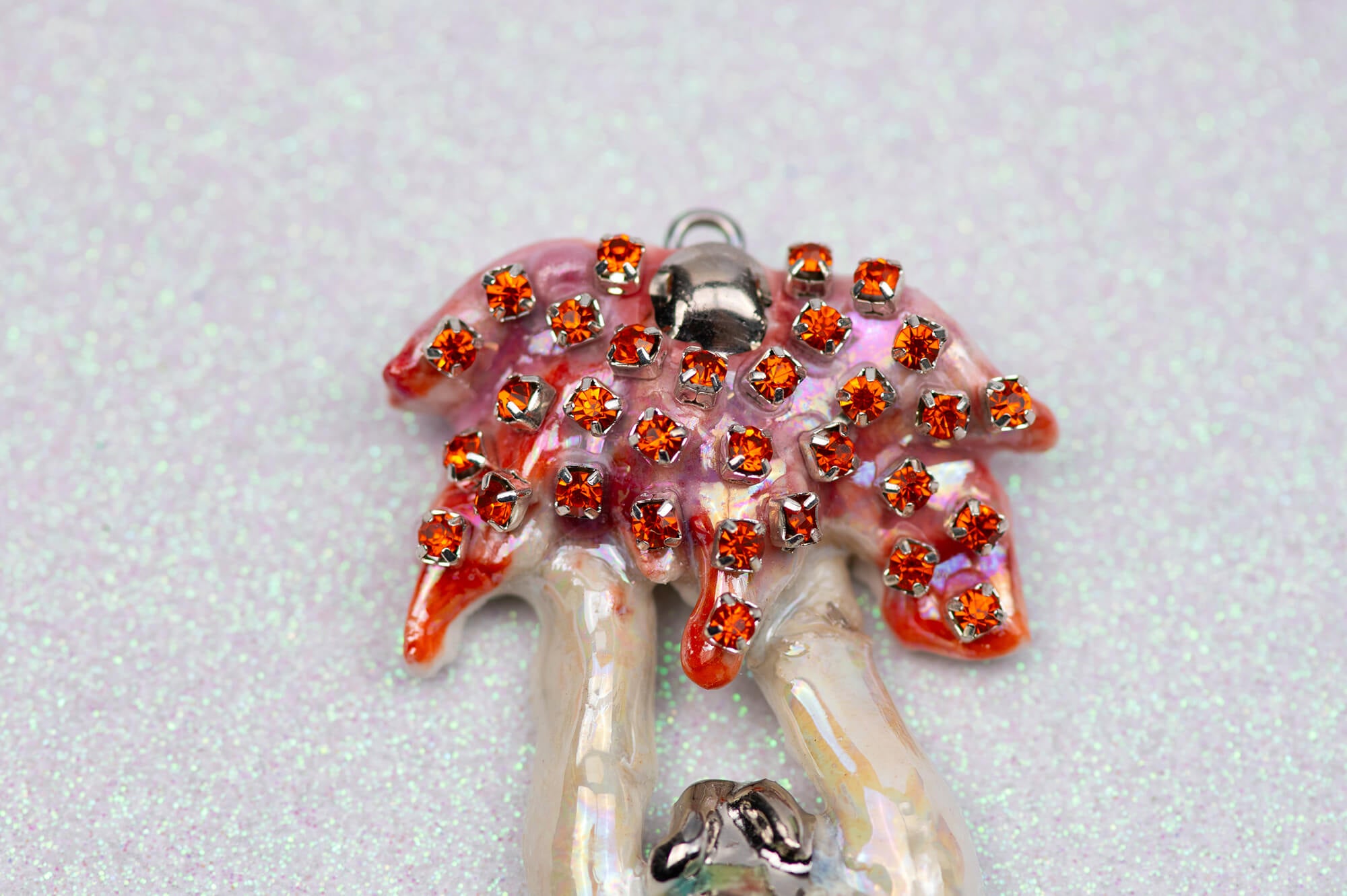 Mermaid carrying red flower charm