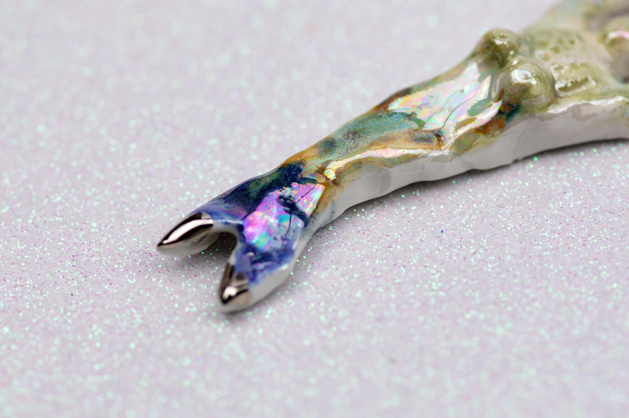 Mermaid with green flower charm
