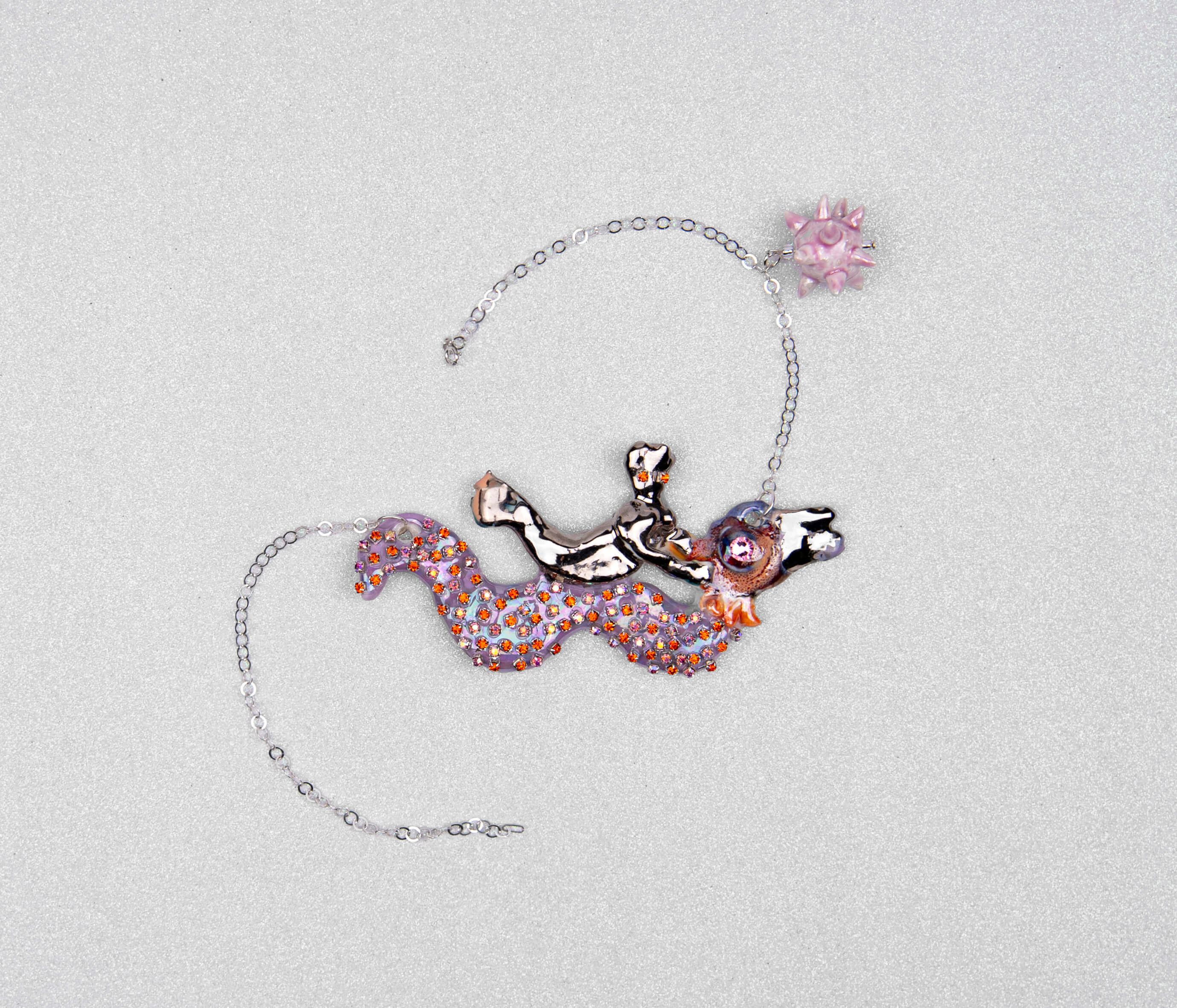 Mermaid riding sea snake necklace