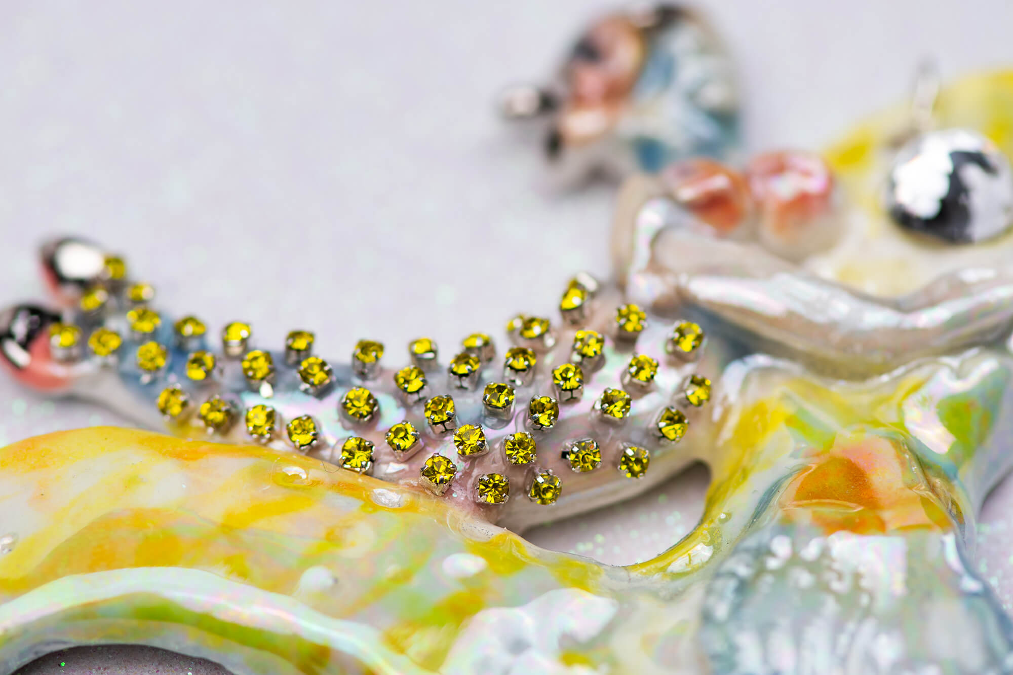 Mermaid riding yellow sea snake