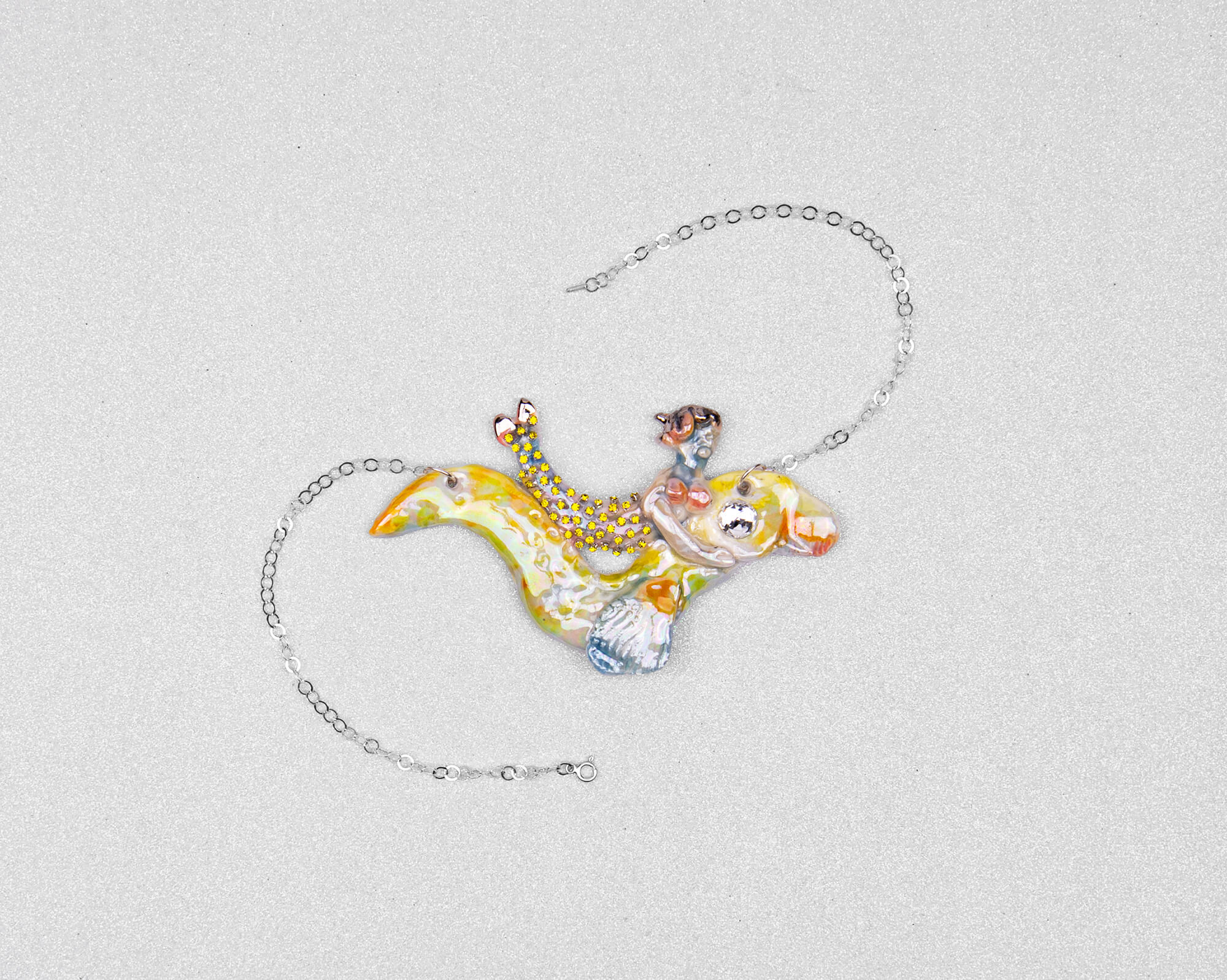 Mermaid riding yellow sea snake