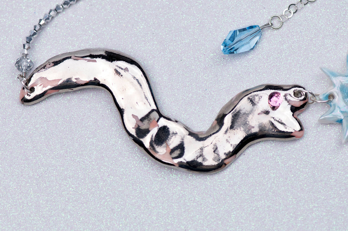 Statement necklace with two silver snakes