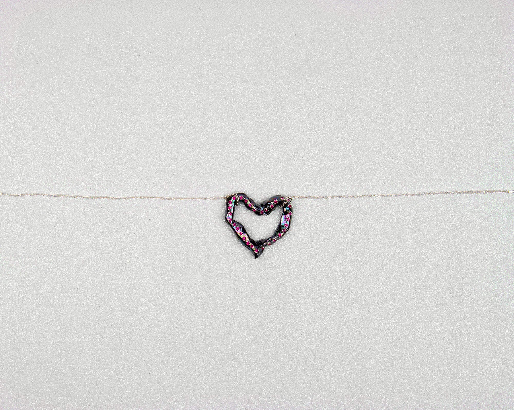 Heart necklace with pink crystals