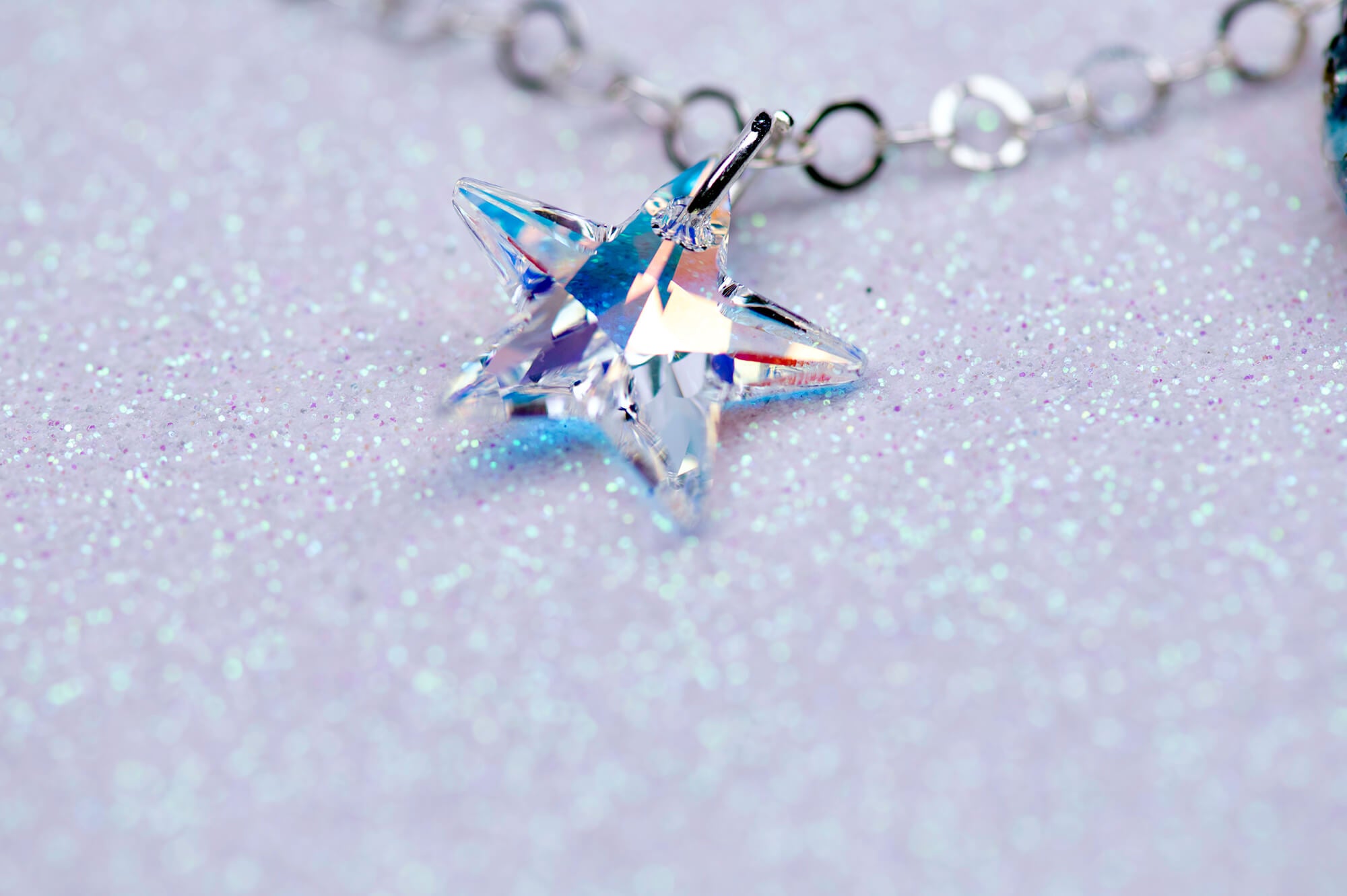 Purple caterpillar necklace with crystal star