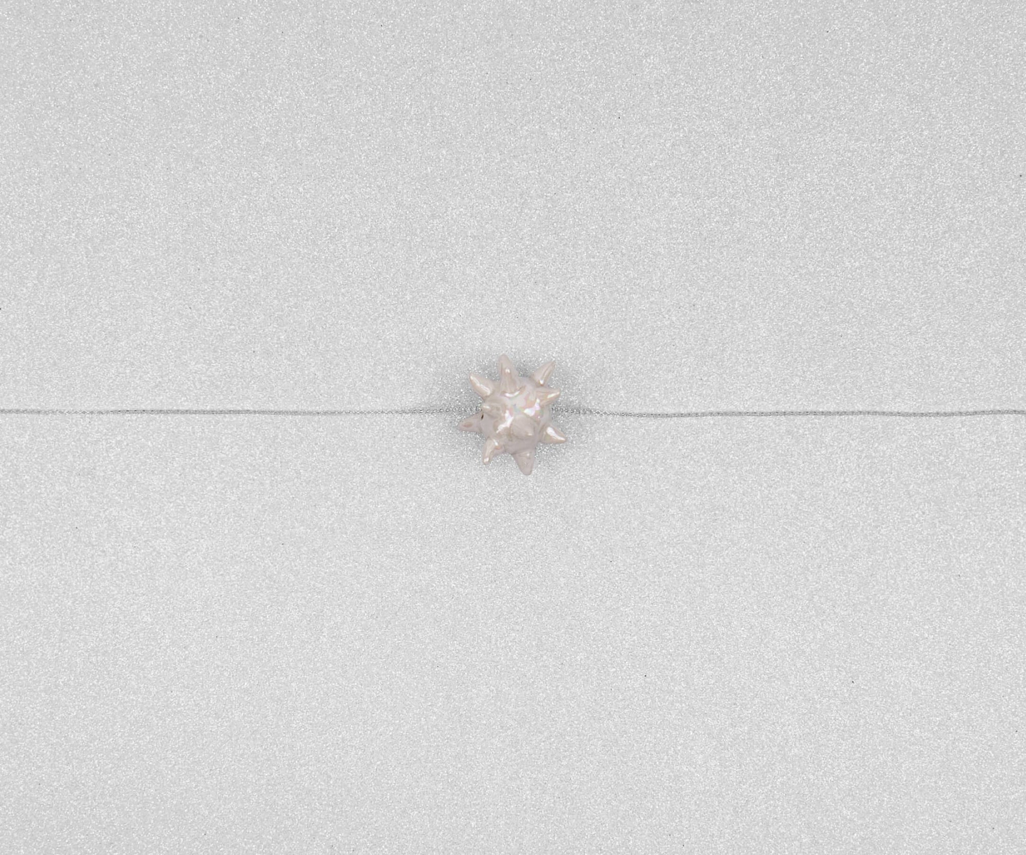 Shimmering spiked star