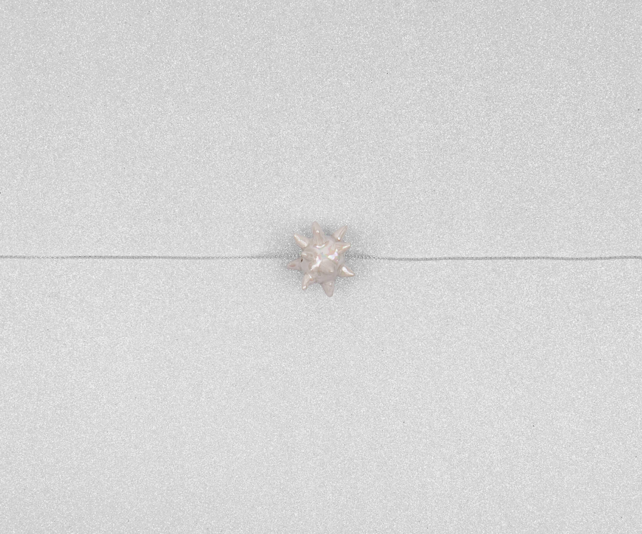 Shimmering spiked star