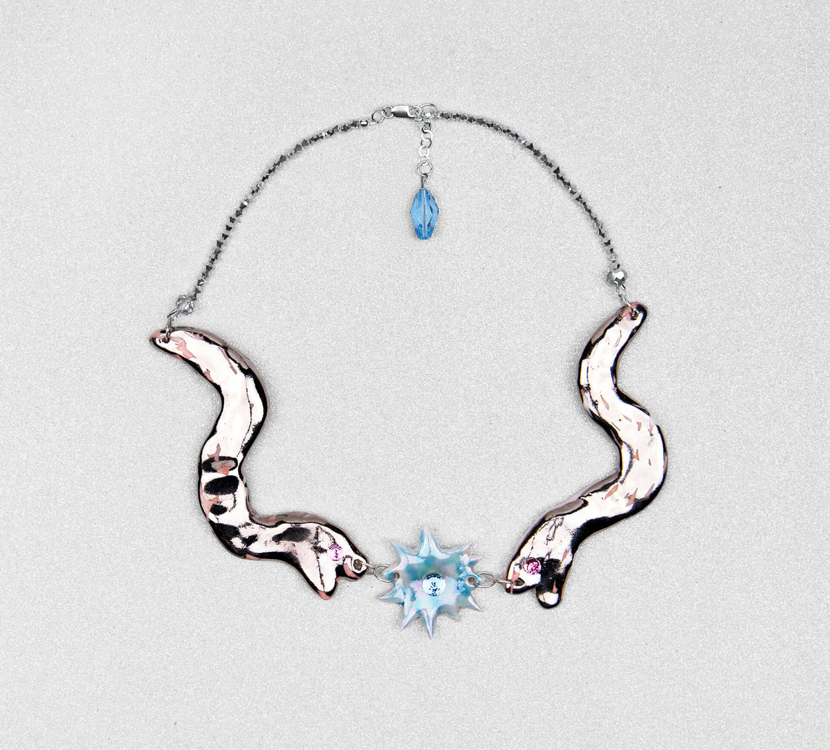 Statement necklace with two silver snakes