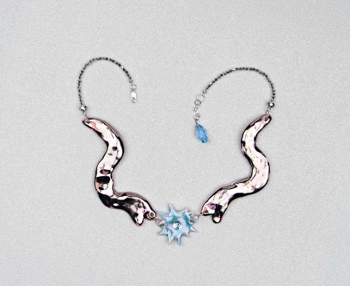 Statement necklace with two silver snakes