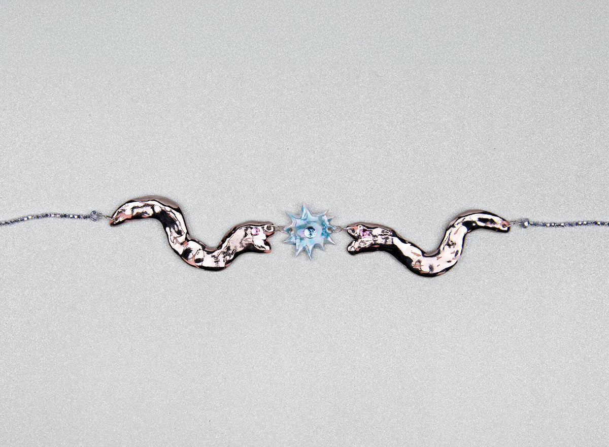 Statement necklace with two silver snakes
