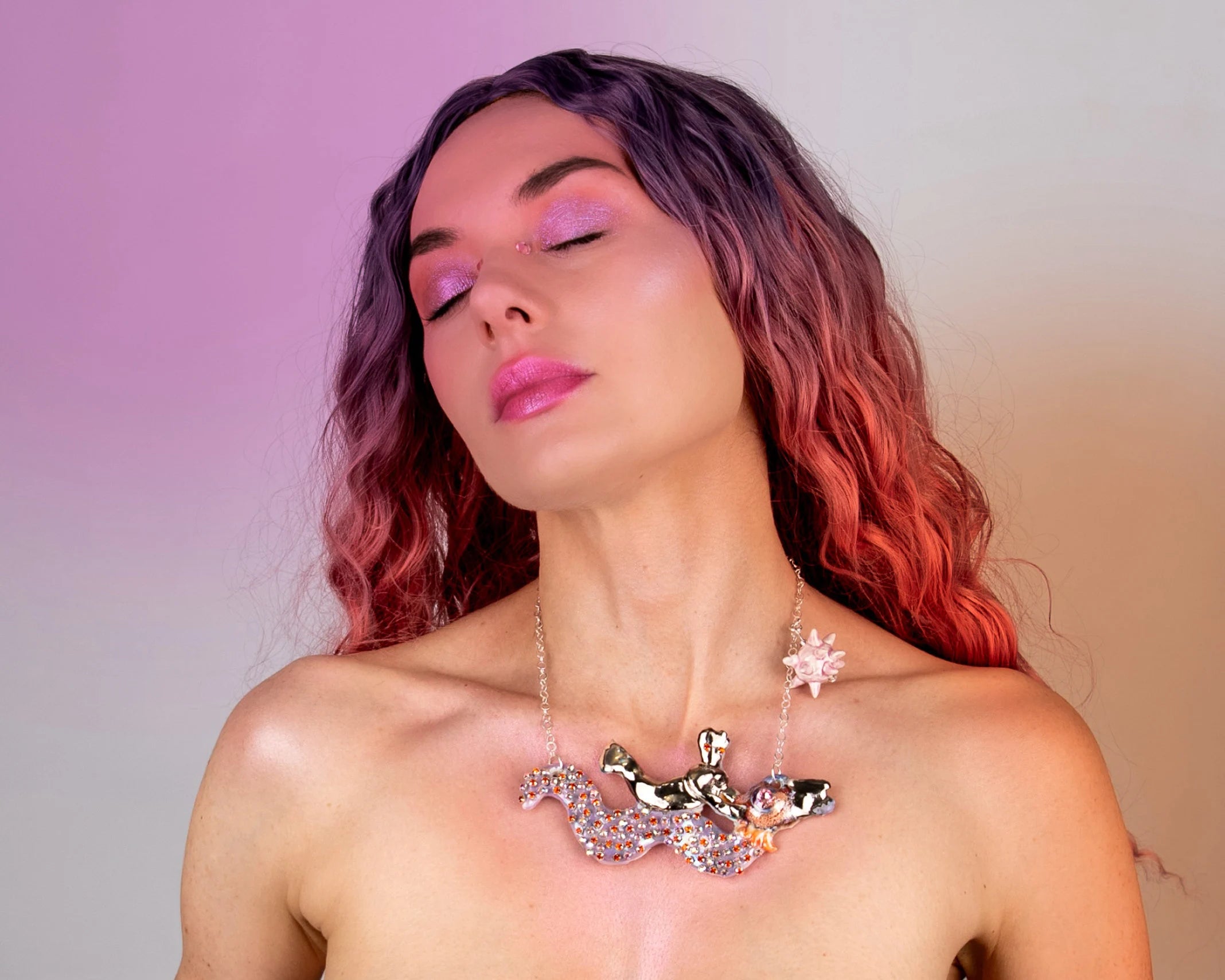 Mermaid riding sea snake necklace