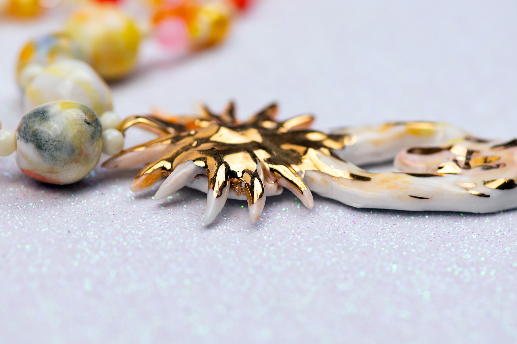Angel with sun rays necklace