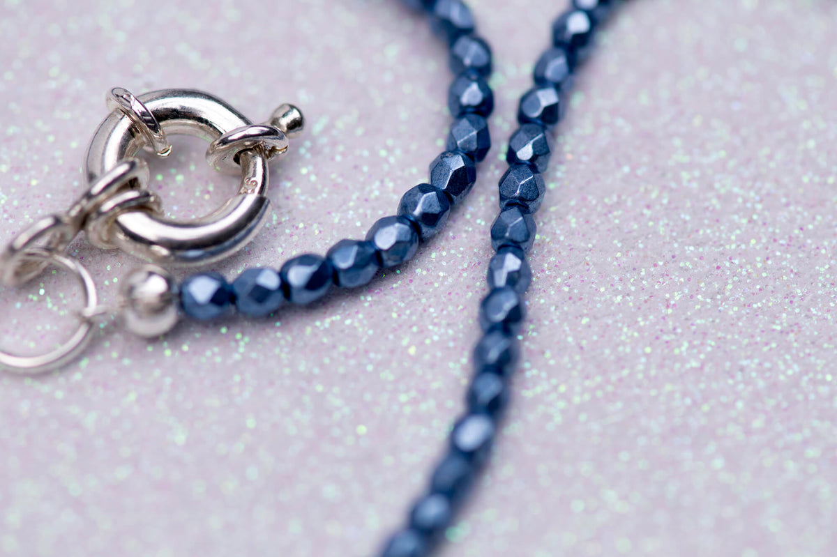 Entwined snakes necklace