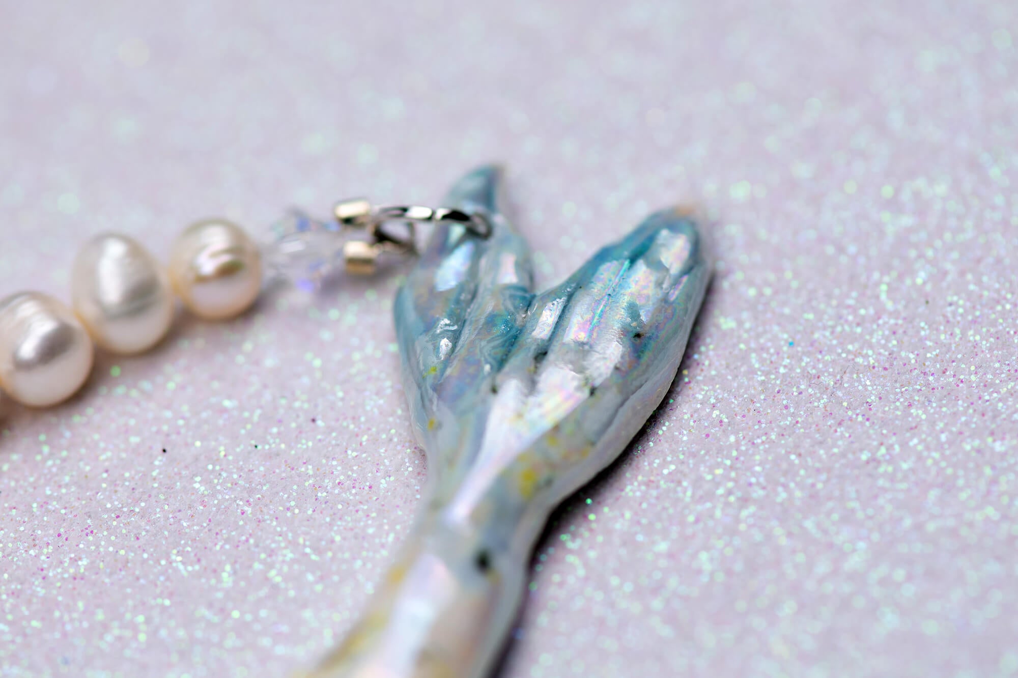 Pastel mermaids with big pearl necklace