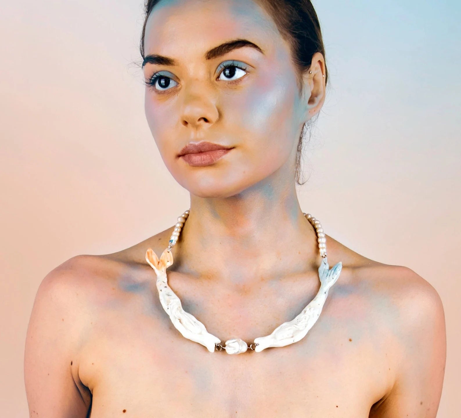 Pastel mermaids with big pearl necklace