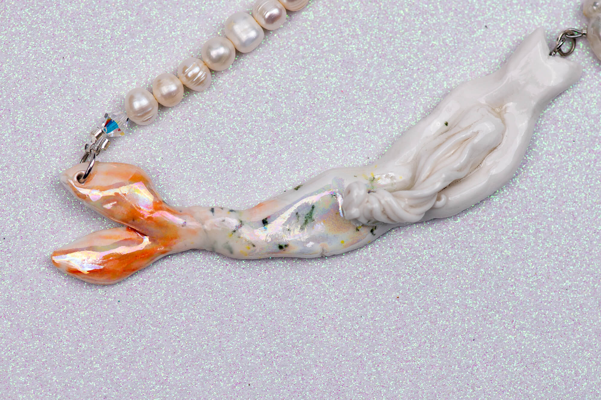 Pastel mermaids with big pearl necklace