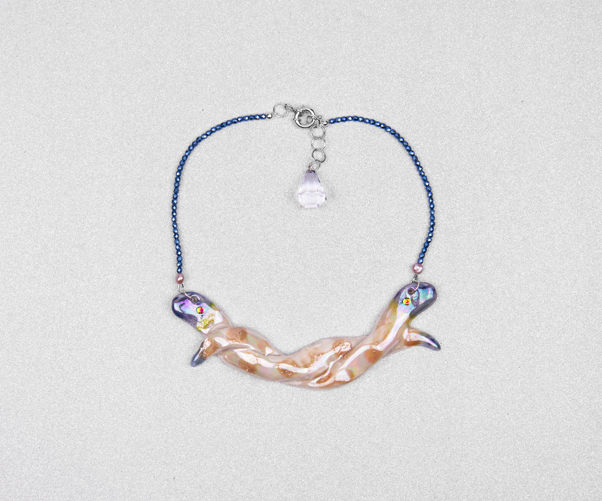 Entwined snakes necklace