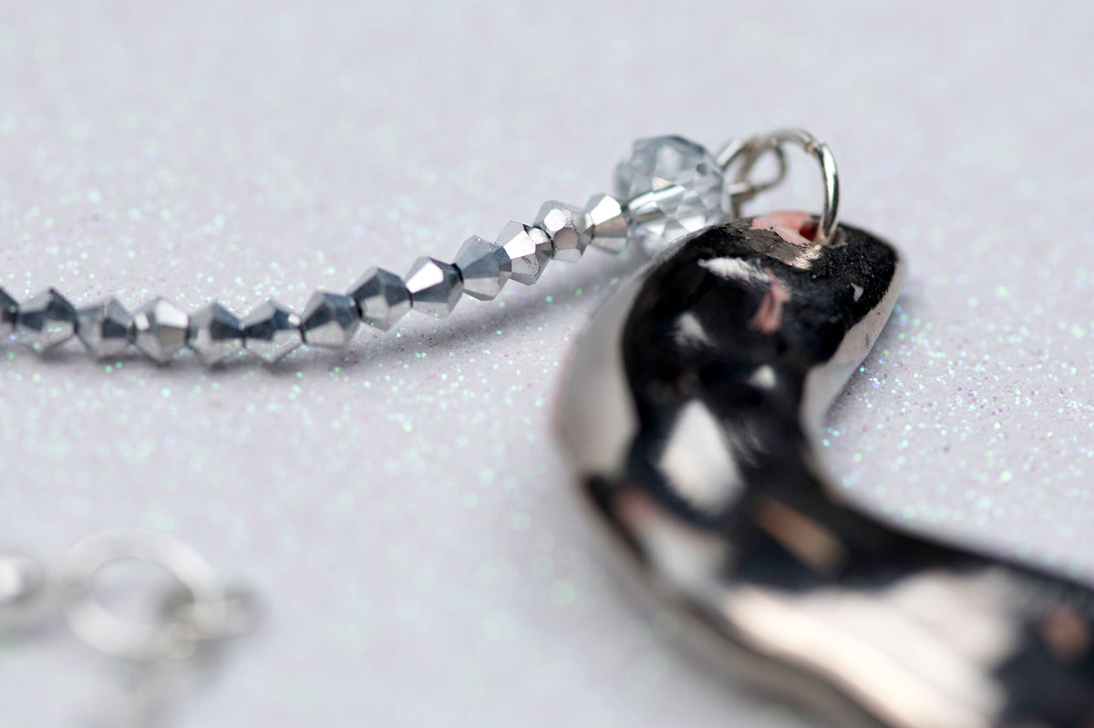 Statement necklace with two silver snakes