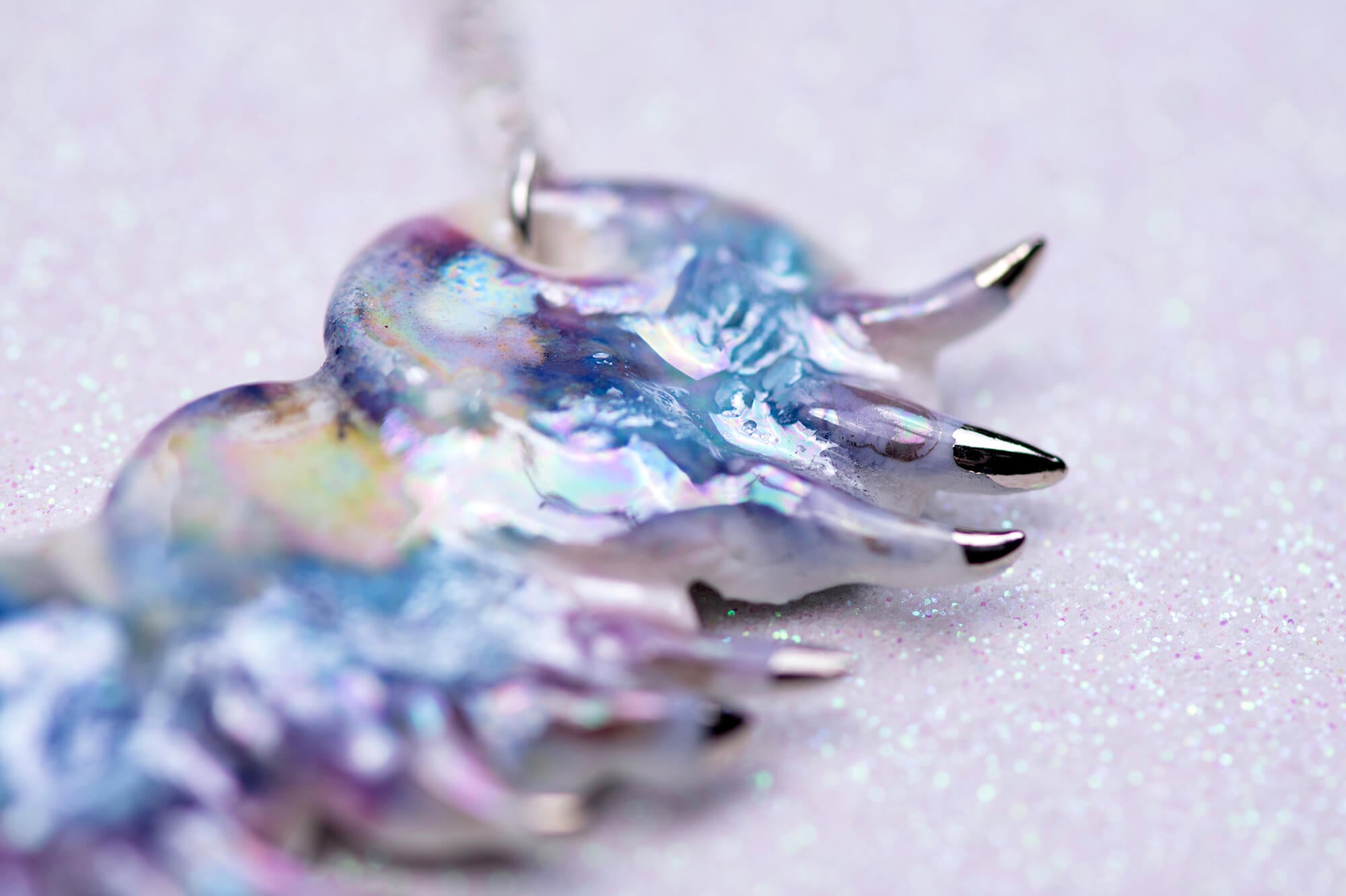 Purple caterpillar necklace with crystal star
